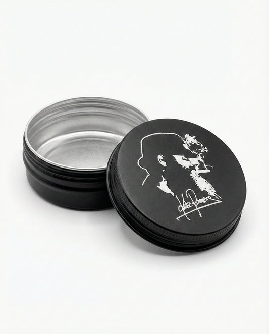 Cajita metálica negra oficial de Kutxi Romero